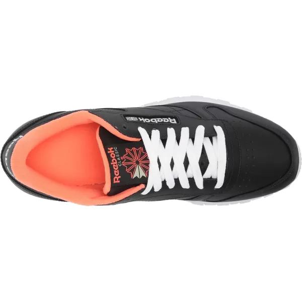 imageReebok Unisex Classic Leather SneakerCore BlackWhiteOrange Flare