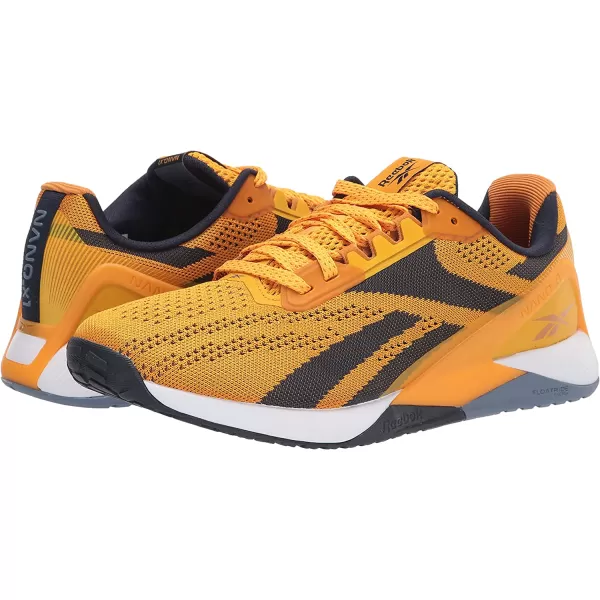 imageReebok UnisexAdult Nano X1 Cross TrainerSemi Solar GoldRadiant OchreVector Navy