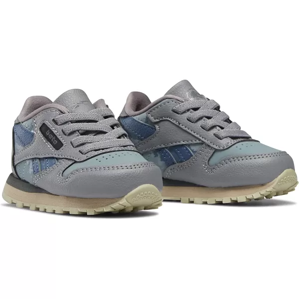 imageReebok UnisexChild Classic Leather SneakerJurassic WorldGreyTeal FogBrave Blue