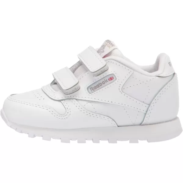 imageReebok UnisexChild Classic Leather SneakerWhiteCarbonVector Blue