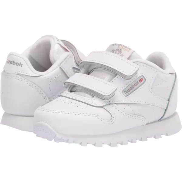 imageReebok UnisexChild Classic Leather SneakerWhiteCarbonVector Blue