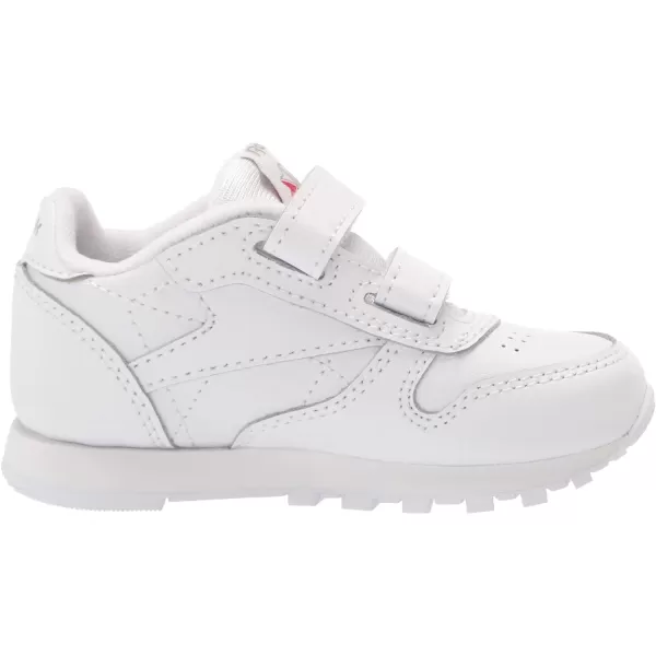 imageReebok UnisexChild Classic Leather SneakerWhiteCarbonVector Blue