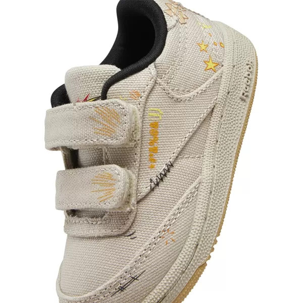 imageReebok UnisexChild Club C SneakerLooney TunesPebbleBright Ochre