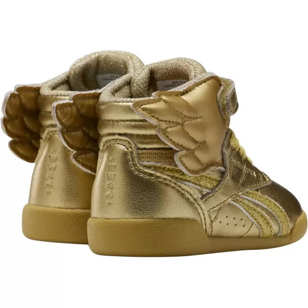 imageReebok UnisexChild Freestyle Hi SneakerGold MetallicExcellent Red