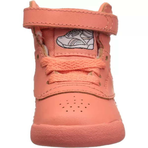 imageReebok UnisexChild Freestyle Hi SneakerStellar PinkWhitePeach Twist