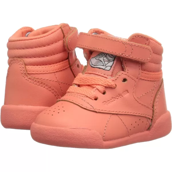 imageReebok UnisexChild Freestyle Hi SneakerStellar PinkWhitePeach Twist