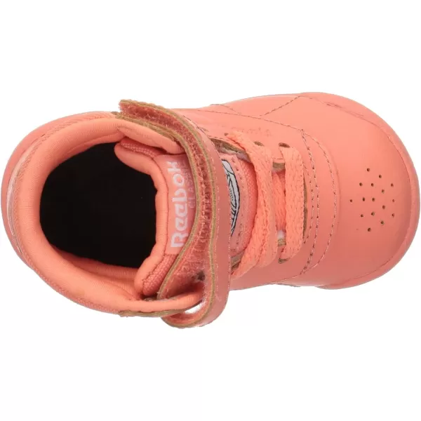 imageReebok UnisexChild Freestyle Hi SneakerStellar PinkWhitePeach Twist
