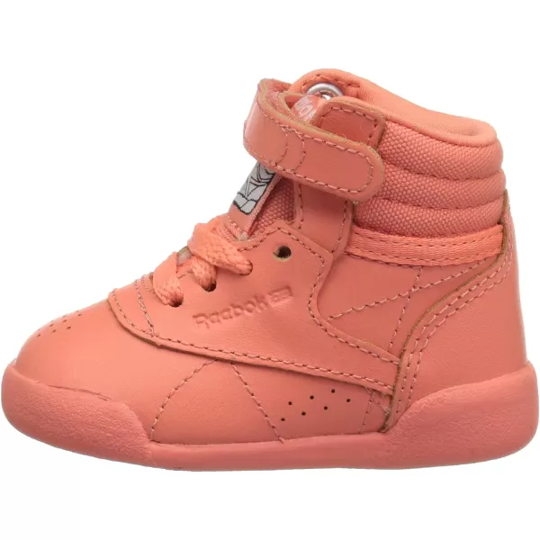 imageReebok UnisexChild Freestyle Hi SneakerStellar PinkWhitePeach Twist
