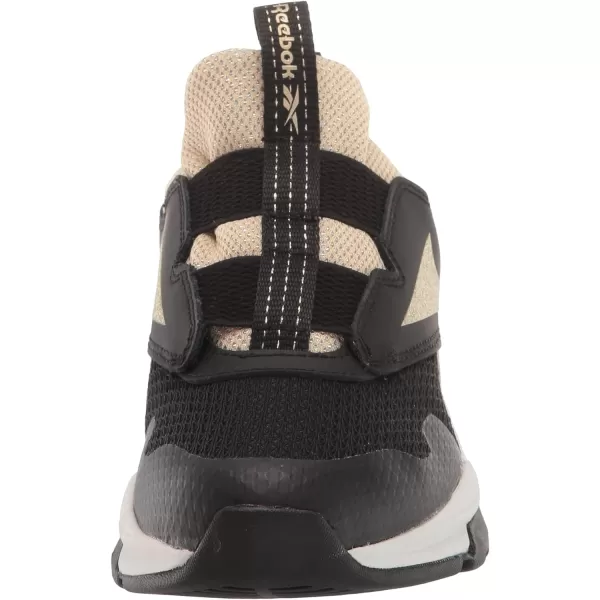 imageReebok UnisexChild Xt Sprinter Slip on Running ShoeBlackGold Metallic
