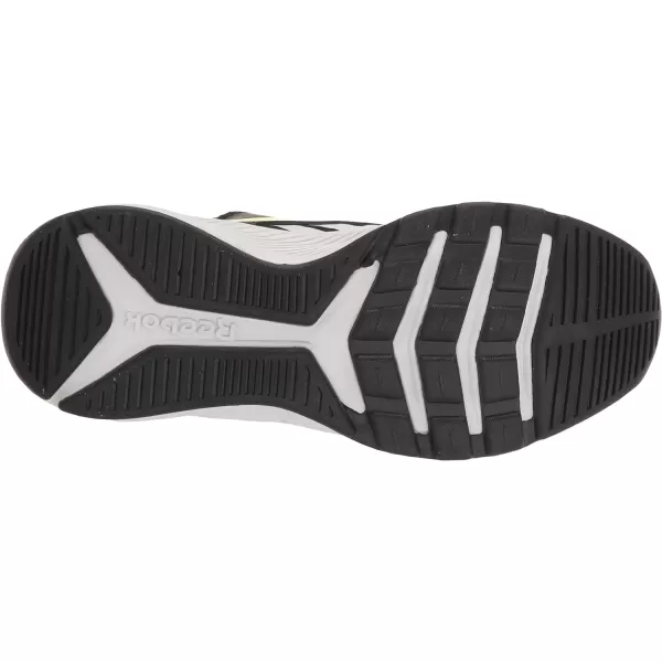 imageReebok UnisexChild Xt Sprinter Slip on Running ShoeBlackSolar Acid YellowWhite