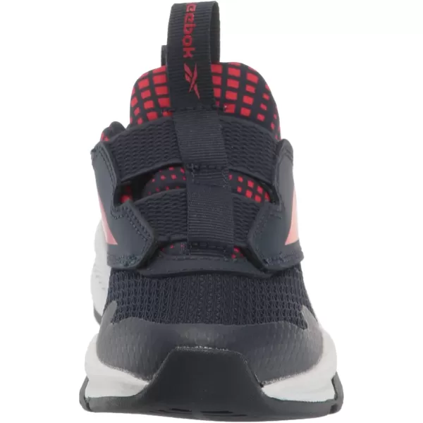 imageReebok UnisexChild Xt Sprinter Slip on Running ShoeVector NavyVector RedWhite