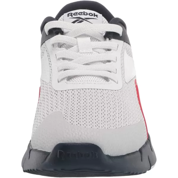 imageReebok UnisexChild Zig Dynamica 20 Sneaker in Vector NavyVector RedPure Grey