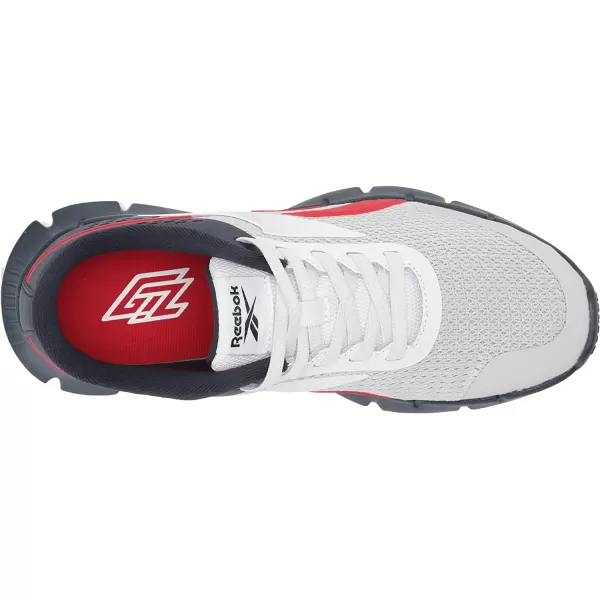 imageReebok UnisexChild Zig Dynamica 20 Sneaker in Vector NavyVector RedPure Grey