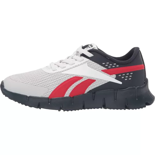 imageReebok UnisexChild Zig Dynamica 20 Sneaker in Vector NavyVector RedPure Grey