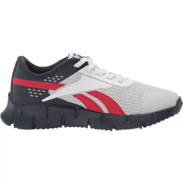 imageReebok UnisexChild Zig Dynamica 20 Sneaker in Vector NavyVector RedPure Grey