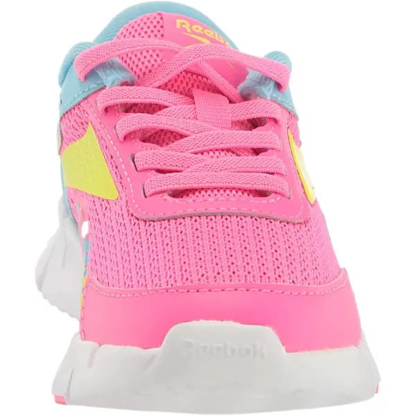 imageReebok UnisexChild Zig Dynamica 20 SneakerAtomic PinkDigital BlueAcid Yellow