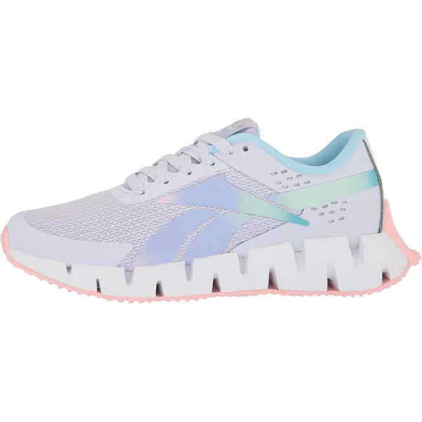imageReebok UnisexChild Zig Dynamica 20 SneakerLucid LilacPink GlowDigital Blue