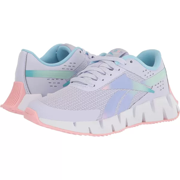imageReebok UnisexChild Zig Dynamica 20 SneakerLucid LilacPink GlowDigital Blue