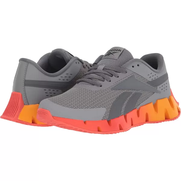 imageReebok UnisexChild Zig Dynamica 20 SneakerPure GreyDynamic RedCollegiate Gold