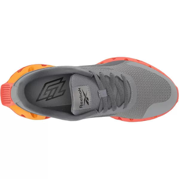 imageReebok UnisexChild Zig Dynamica 20 SneakerPure GreyDynamic RedCollegiate Gold