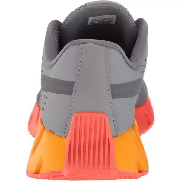 imageReebok UnisexChild Zig Dynamica 20 SneakerPure GreyDynamic RedCollegiate Gold