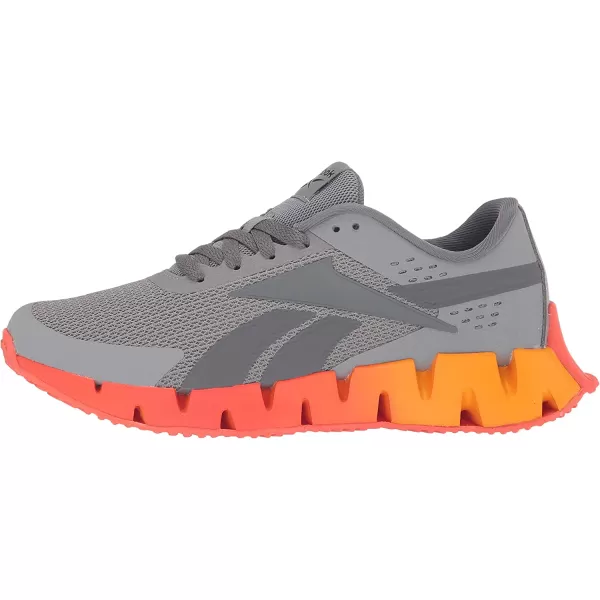 imageReebok UnisexChild Zig Dynamica 20 SneakerPure GreyDynamic RedCollegiate Gold