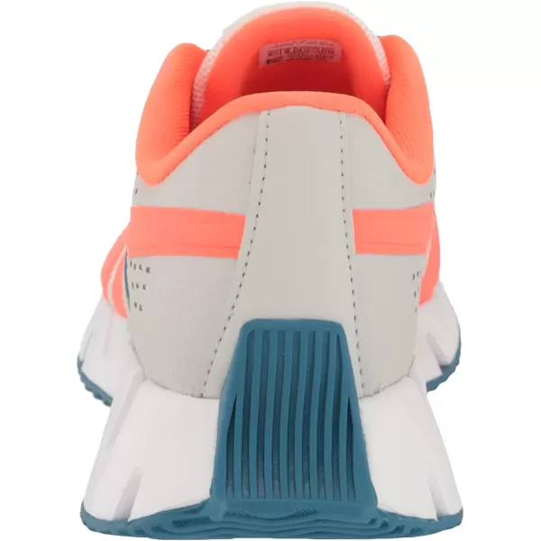 imageReebok UnisexChild Zig Dynamica 20 SneakerPure GreyOrange FlareSteely Blue