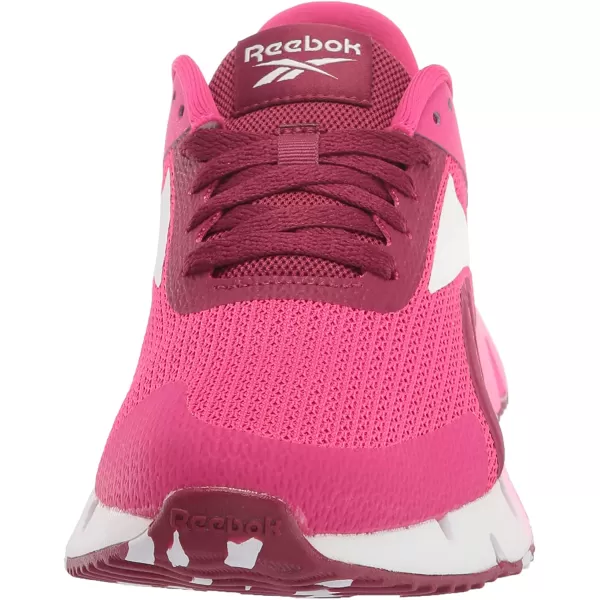 imageReebok UnisexChild Zig Dynamica 20 SneakerPursuit PinkPunch BerryPixel Mint