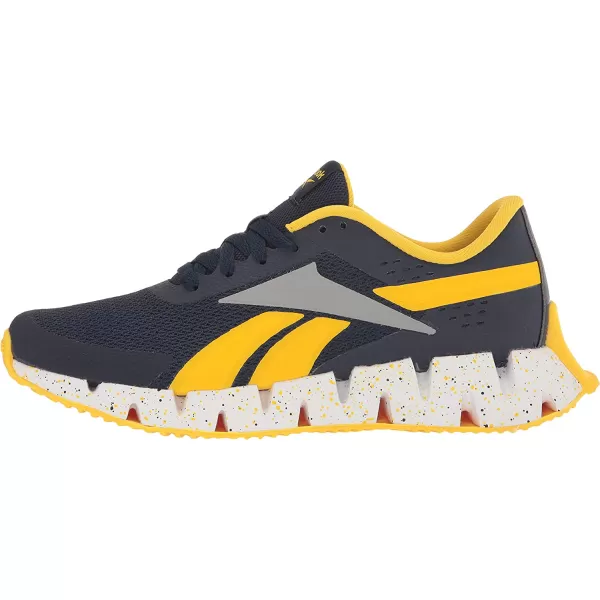 imageReebok UnisexChild Zig Dynamica 20 SneakerVector NavyAlways YellowPure Grey