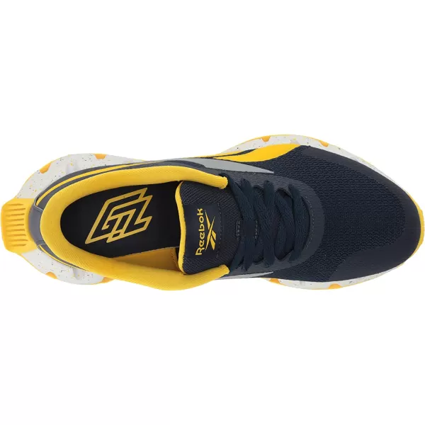 imageReebok UnisexChild Zig Dynamica 20 SneakerVector NavyAlways YellowPure Grey