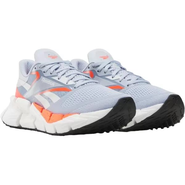 imageReebok Womens Floatzig 1 SneakerPale BlueFootwear WhiteOrange Flare