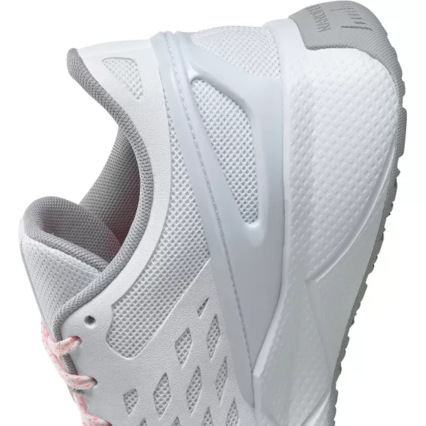 imageReebok Womens Nanoflex TR Cross TrainerWhitePure GreyOrange Flare