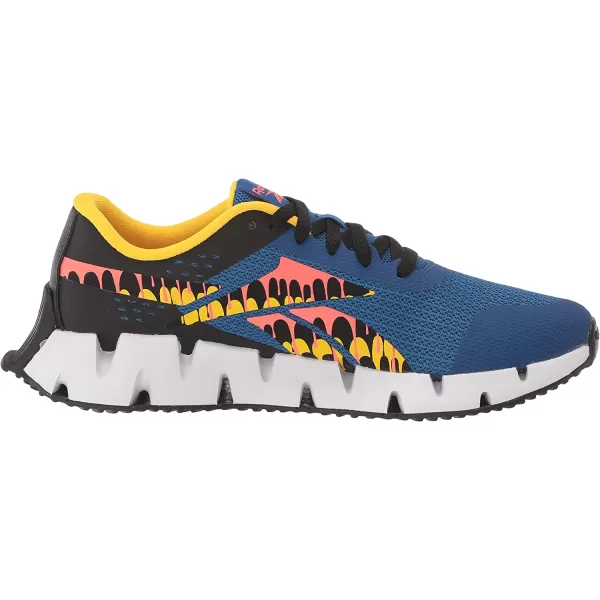 imageReebok Zig Dynamica 20 Sneaker  UnisexChild Vector BlueBlackOrange Flare