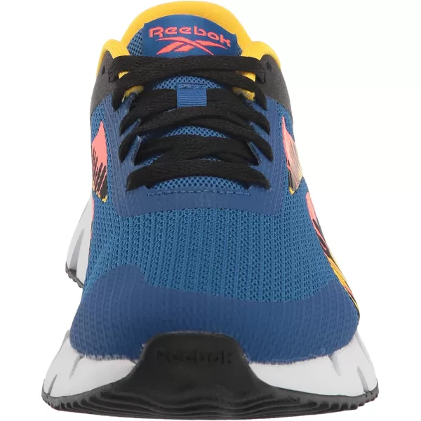 imageReebok Zig Dynamica 20 Sneaker  UnisexChild Vector BlueBlackOrange Flare