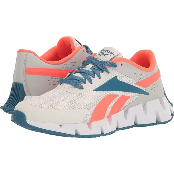 imageReebok Zig Dynamica 20 Sneaker for UnisexChild Pure GreyOrange FlareSteely Blue