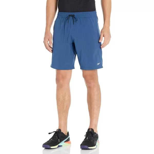 imageReebok Mens Standard Workout Ready Woven Shorts in Batik Blue with White Small Logo