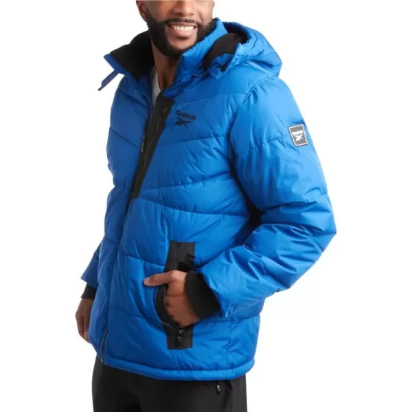 imageReebok Mens Winter Jacket  Heavyweight Quilted Puffer Parka Coat  Weather Resistant Jacket for Men LXXLVector Blue