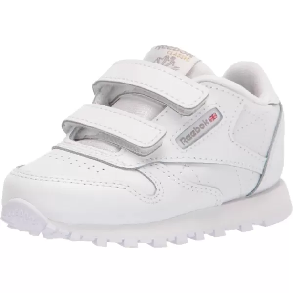 imageReebok UnisexChild Classic Leather SneakerWhiteCarbonVector Blue