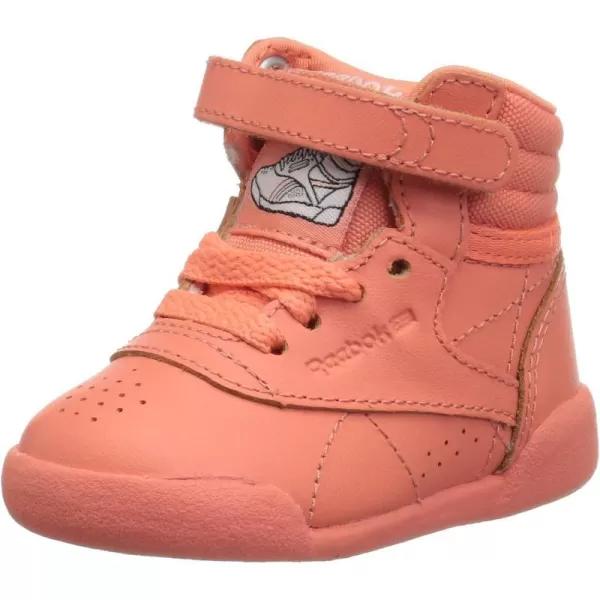 imageReebok UnisexChild Freestyle Hi SneakerStellar PinkWhitePeach Twist