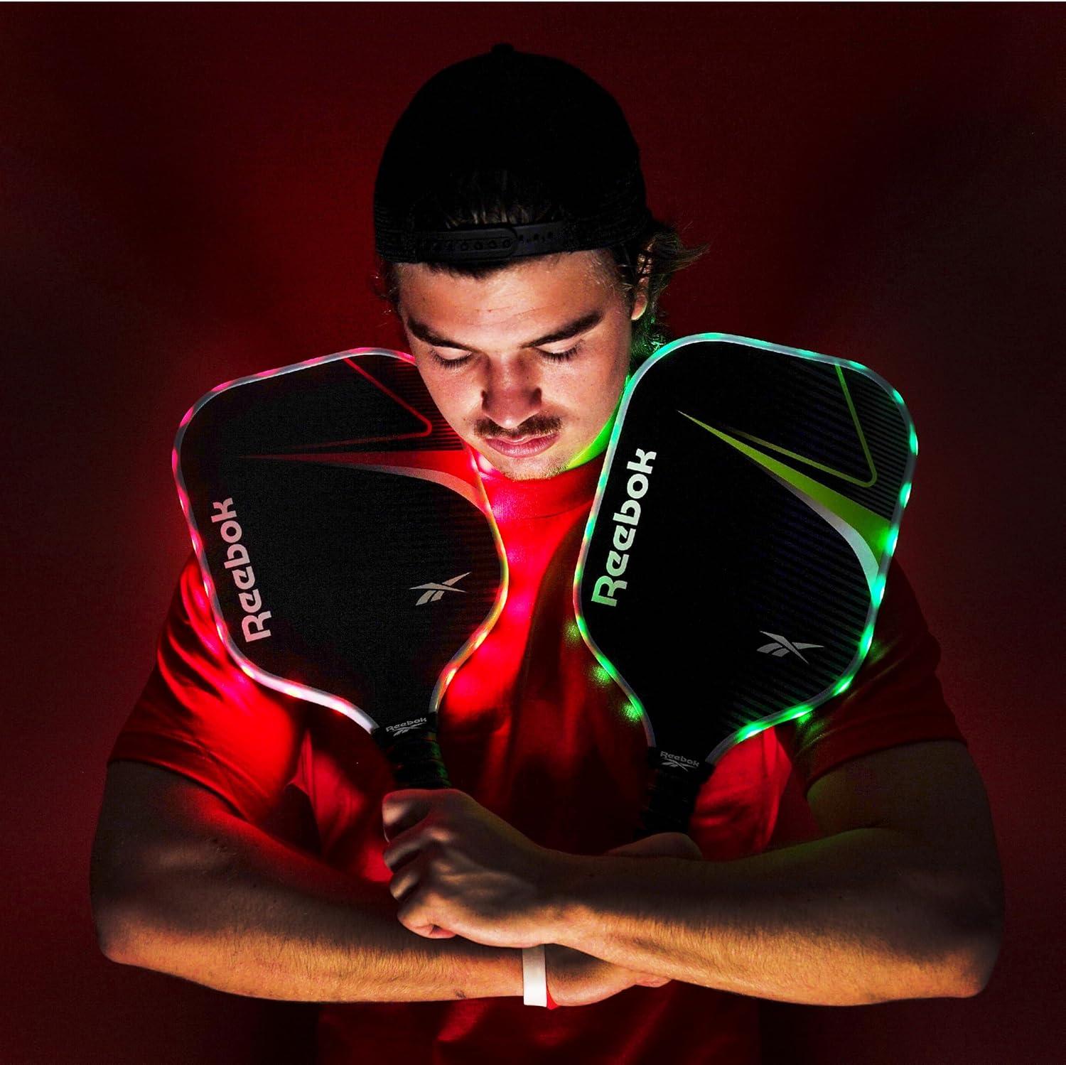 imageReebok  LED Pickleball Set for 2 Includes 2 Fiberglass Paddles with 5quot Cushion Grip and 2 LightUp Balls Perfect for Night Play RedGreen