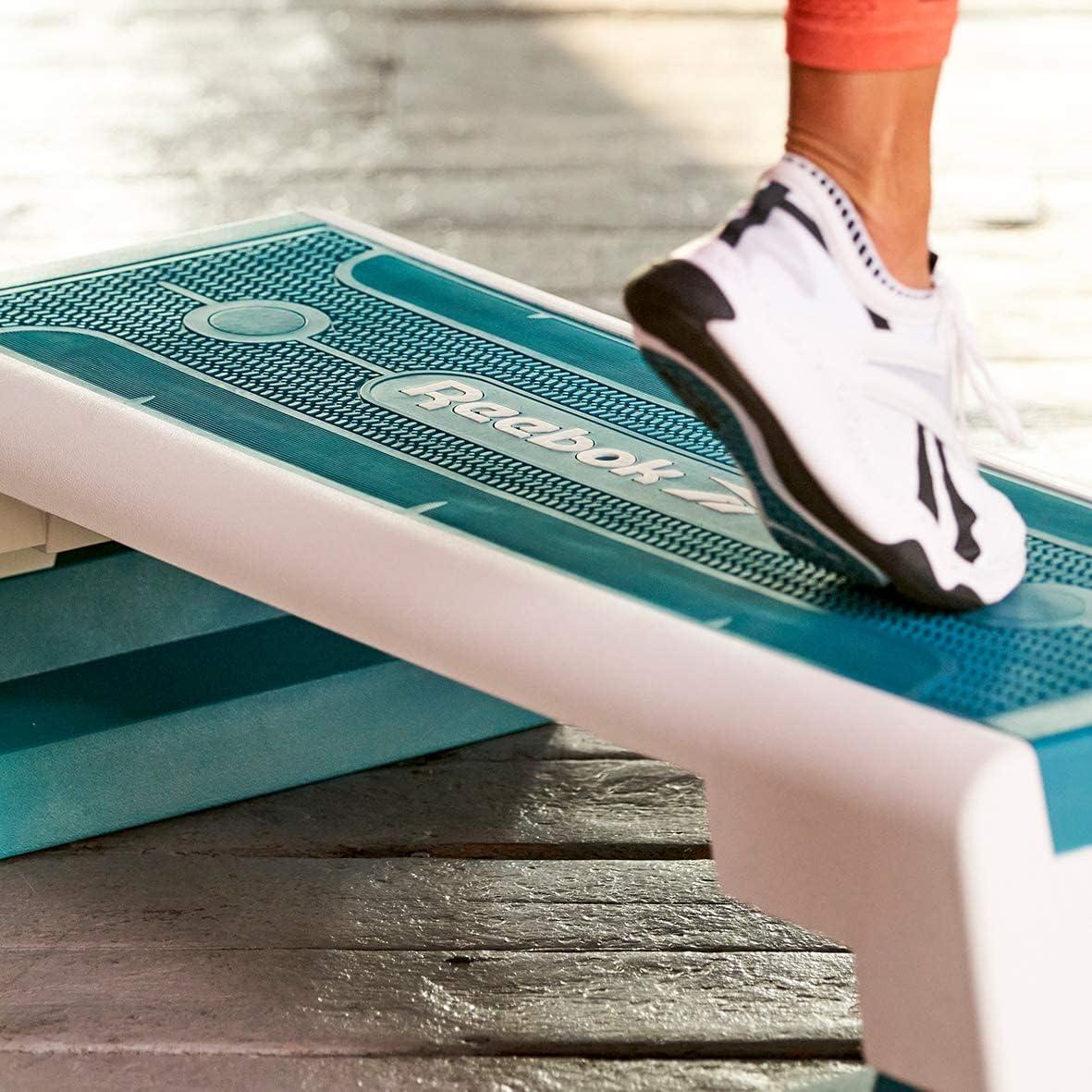 imageReebok Fitness Multipurpose Adjustable Aerobic and Strength Training Workout Step Platform for HIIT Cardio and General SessionsTeal