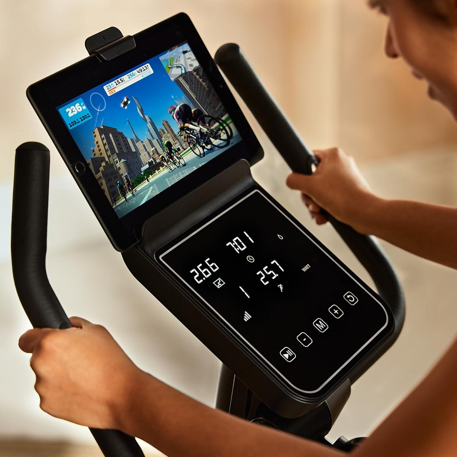 imageReebok Fitness Stationary Bike Bluetooth Compatible Indoor Cycling Bike 24 Resistance Levels 12 Workouts Upright Exercise Bike with Gel Pad SaddleRed