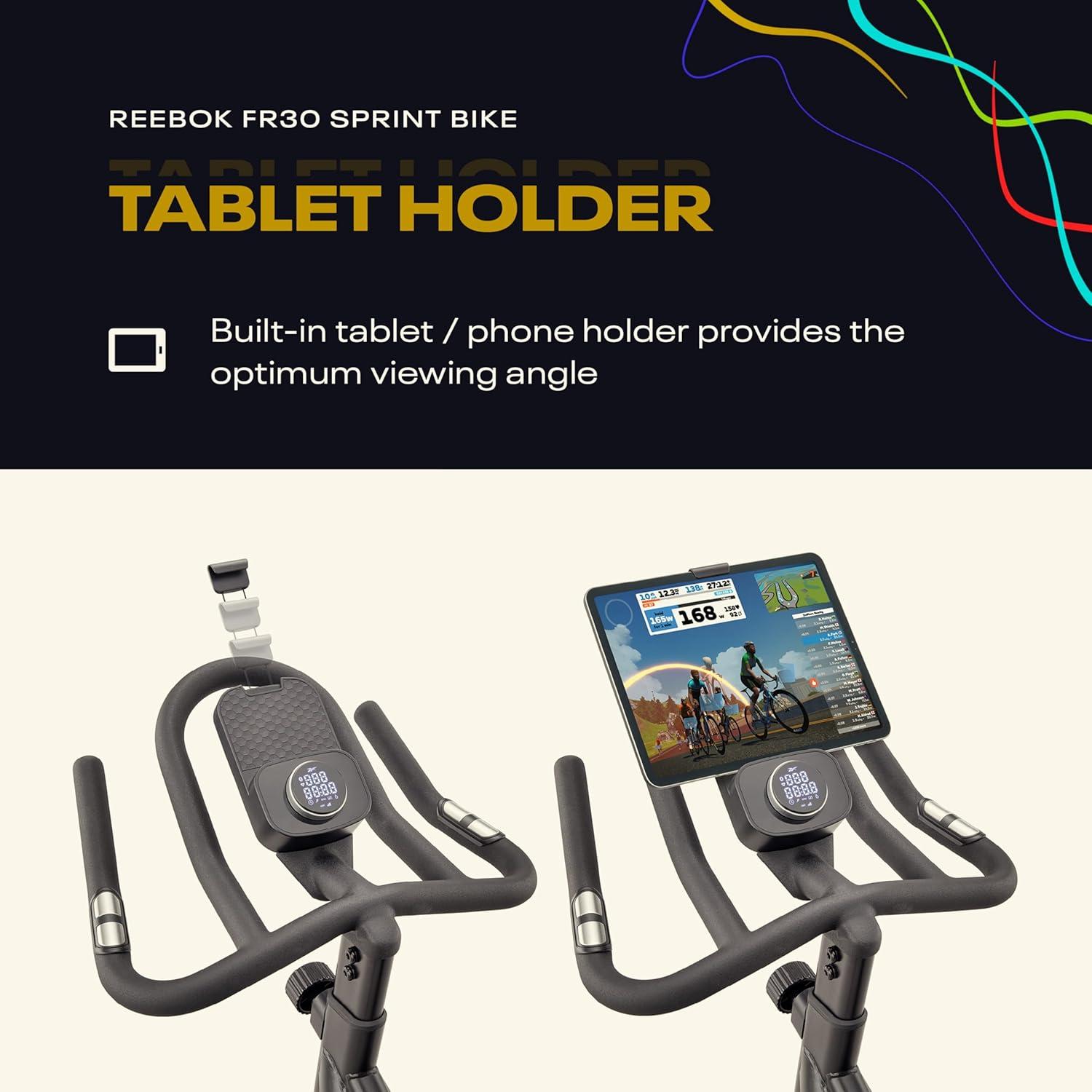 imageReebok Fitness Stationary Bike Bluetooth Compatible Indoor Cycling Bike 24 Resistance Levels 12 Workouts Upright Exercise Bike with Gel Pad SaddleReebok FR30 Sprint Bike
