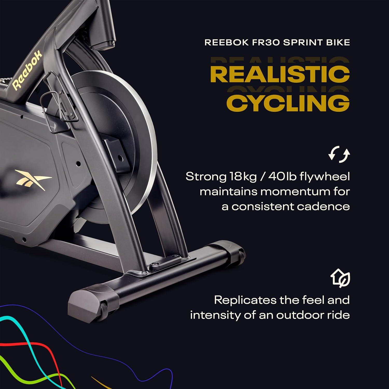 imageReebok Fitness Stationary Bike Bluetooth Compatible Indoor Cycling Bike 24 Resistance Levels 12 Workouts Upright Exercise Bike with Gel Pad SaddleReebok FR30 Sprint Bike