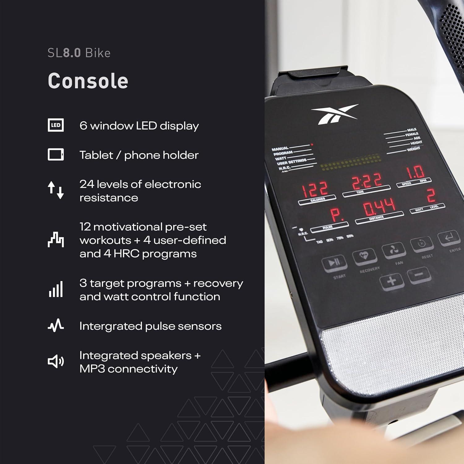 imageReebok Fitness Stationary Bike Bluetooth Compatible Indoor Cycling Bike 24 Resistance Levels 12 Workouts Upright Exercise Bike with Gel Pad SaddleSilver