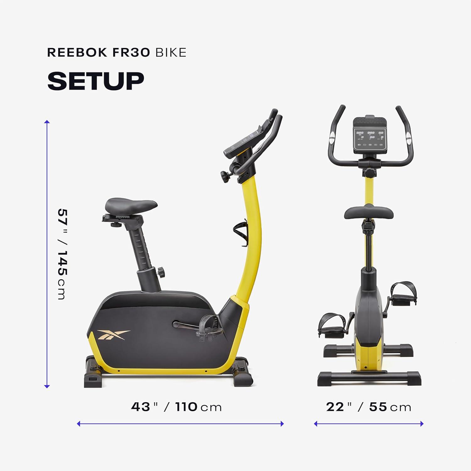imageReebok Fitness Stationary Bike Bluetooth Compatible Indoor Cycling Bike 24 Resistance Levels 12 Workouts Upright Exercise Bike with Gel Pad SaddleYellow