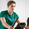 imageReebok Fitness Stationary Bike Bluetooth Compatible Indoor Cycling Bike 24 Resistance Levels 12 Workouts Upright Exercise Bike with Gel Pad SaddleSilver