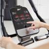 imageReebok Fitness Stationary Bike Bluetooth Compatible Indoor Cycling Bike 24 Resistance Levels 12 Workouts Upright Exercise Bike with Gel Pad SaddleSilver