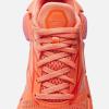 imageReebok Womenss Floatzig 1 SneakerCoral Red