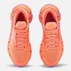 imageReebok Womenss Floatzig 1 SneakerCoral Red